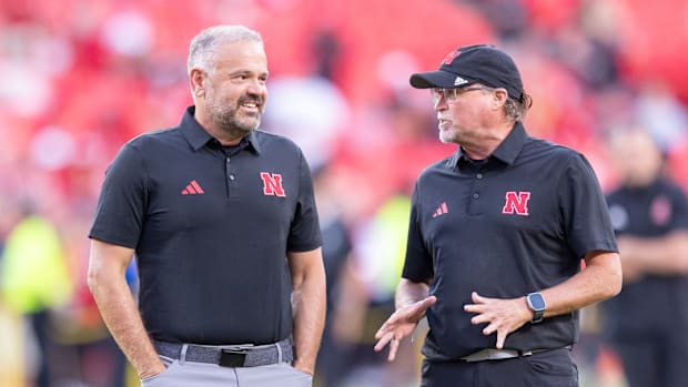 Nebraska head coach Matt Rhule and offensive coordinator Dana Holgorsen before the 2025 Cincinnati game