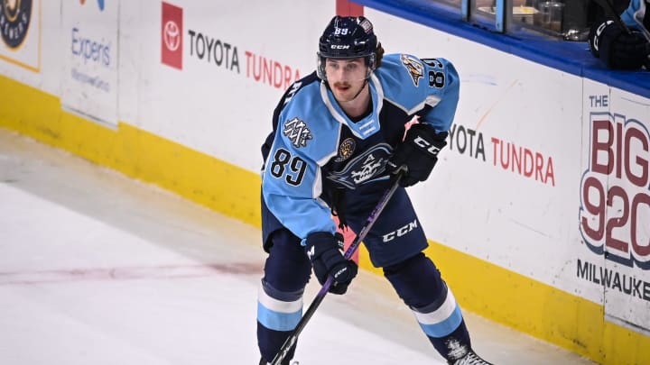 Milwaukee Admirals forward Ozzy Wiesblatt (89) looks to pass the puck against the Henderson Silver Knights during the second period Saturday, March 23, 2024, at the UW-Milwaukee Panther Arena in Milwaukee, Wisconsin.