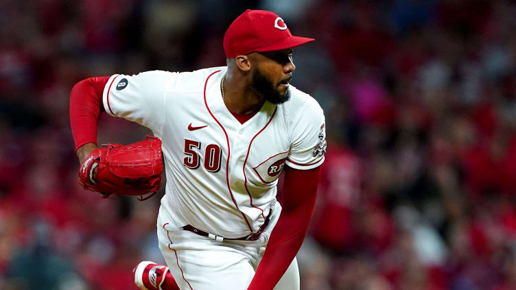 Cincinnati Reds relief pitcher Amir Garrett (50) follows through on delivery.