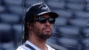 Jul 24, 2024; Bronx, New York, USA; New York Knicks guard Jalen Brunson watches batting practice before a game between the New York Yankees and the New York Mets at Yankee Stadium. Mandatory Credit: Brad Penner-USA TODAY Sports