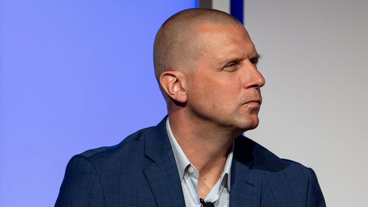 Kentucky head basketball coach Mark Pope listened while Louisville basketball coach Pat Kelsey spoke at the 2024 Leadership Louisville Luncheon at the Kentucky International Convention Center in downtown Louisville on Wednesday, August 28, 2024.