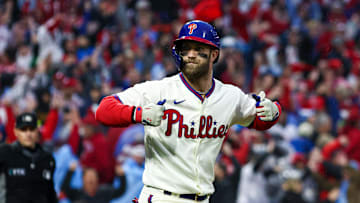 Oct 23, 2022; Philadelphia, Pennsylvania, USA; Philadelphia Phillies designated hitter Bryce Harper (3) reacts after hitting a two-run home run in the eighth inning during game five of the NLCS against the San Diego Padres for the 2022 MLB Playoffs at Citizens Bank Park. Mandatory Credit: Bill Streicher-Imagn Images