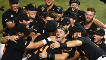 Tennessee's Cal Stark (10) and Marcus Phillips (44) celebrate their win over Evansville in the Knoxville Super Regional of the NCAA baseball tournament on Sunday, June 9, 2024 in Knoxville, Tenn.