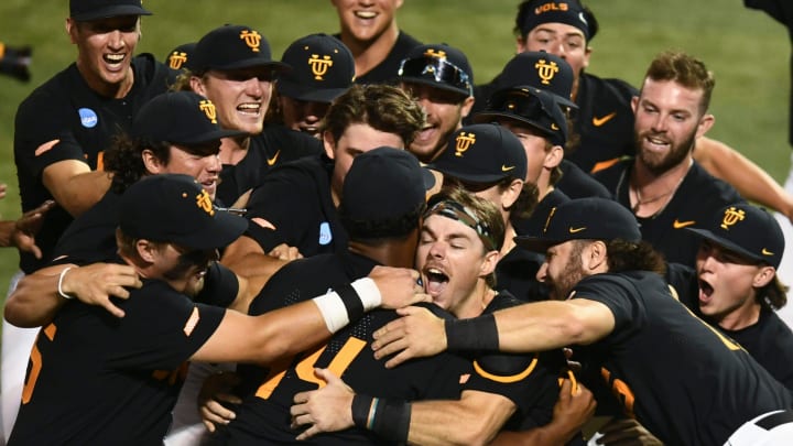 Tennessee's Cal Stark (10) and Marcus Phillips (44) celebrate their win over Evansville in the Knoxville Super Regional of the NCAA baseball tournament on Sunday, June 9, 2024 in Knoxville, Tenn.