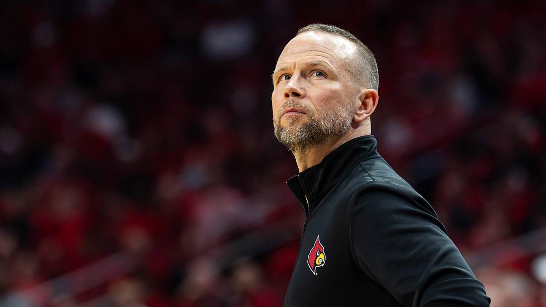 Louisville Cardinals head coach Pat Kelsey looks up at the scoreboard as the Louisville Cardinals host the Georgia Tech Yellow Jackets in an NCAA basketball game at the KFC Yum! Center, Saturday, Feb. 21, 2026, in Louisville.