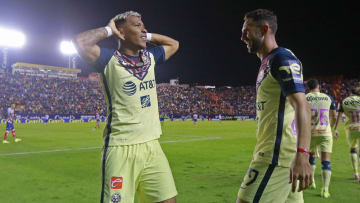 Player Roger Martínez celebrates a goal with América.