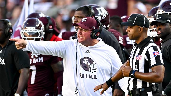 Sep 27, 2025; College Station, Texas, USA; Texas A&M Aggies head coach Mike Elko reacts against the Auburn Tigers during the fourth quarter at Kyle Field. Mandatory Credit: Maria Lysaker-Imagn Images