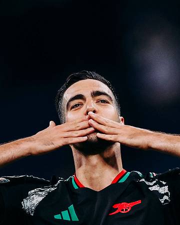 Arsenal's Spanish midfielder #23 Mikel Merino celebrates at the end of the UEFA Champions League quarter final second leg football match between Real Madrid CF and Arsenal at Santiago Bernabeu Stadium in Madrid on April 16, 2025. (Photo by OSCAR DEL POZO / AFP via Getty Images) Arsenal's Spanish midfielder #23 Mikel Merino celebrates at the end of the UEFA Champions League quarter final second leg football match between Real Madrid CF and Arsenal at Santiago Bernabeu Stadium in Madrid on April 16, 2025. (Photo by OSCAR DEL POZO / AFP via Getty Images)