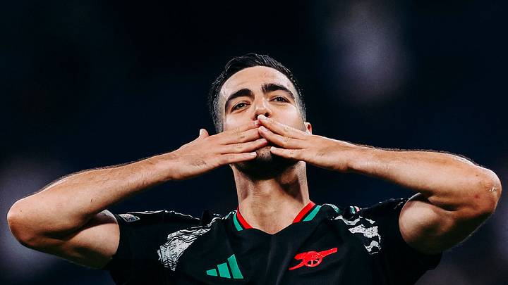 Arsenal's Spanish midfielder #23 Mikel Merino celebrates at the end of the UEFA Champions League quarter final second leg football match between Real Madrid CF and Arsenal at Santiago Bernabeu Stadium in Madrid on April 16, 2025. (Photo by OSCAR DEL POZO / AFP via Getty Images) Arsenal's Spanish midfielder #23 Mikel Merino celebrates at the end of the UEFA Champions League quarter final second leg football match between Real Madrid CF and Arsenal at Santiago Bernabeu Stadium in Madrid on April 16, 2025. (Photo by OSCAR DEL POZO / AFP via Getty Images)