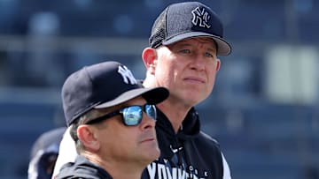 Jul 21, 2023; Bronx, New York, USA; New York Yankees manager Aaron Boone (17) and hitting coach Sean Casey (right) watch batting practice before a game against the Kansas City Royals at Yankee Stadium