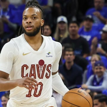 Apr 25, 2024; Orlando, Florida, USA; Cleveland Cavaliers guard Darius Garland (10) brings the ball up court during the first quarter of game three of the first round for the 2024 NBA playoffs at Kia Center.