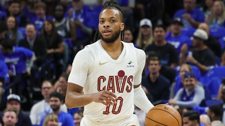 Apr 25, 2024; Orlando, Florida, USA; Cleveland Cavaliers guard Darius Garland (10) brings the ball up court during the first quarter of game three of the first round for the 2024 NBA playoffs at Kia Center.