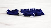 Jan 19, 2015; Toronto, Ontario, CAN; A Toronto Maple Leafs jersey lies on the ice after being thrown by a fan during the third period against the Carolina Hurricanes at the Air Canada Centre. Carolina defeated Toronto 4-1. Mandatory Credit: John E. Sokolowski-Imagn Images
