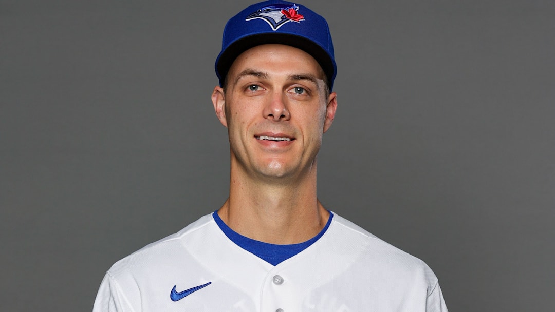 Feb 20, 2026; Dunedin, FL, USA; Toronto Blue Jays pitcher Tyler Rogers (71) poses for a photo during media day at the Player Development Complex. 