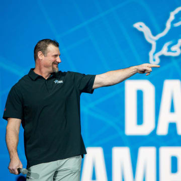 Head Coach Dan Campbell stands on stage during the Detroit Lions' new uniform reveal event inside Ford Field in Detroit on Thursday, April 18, 2024.