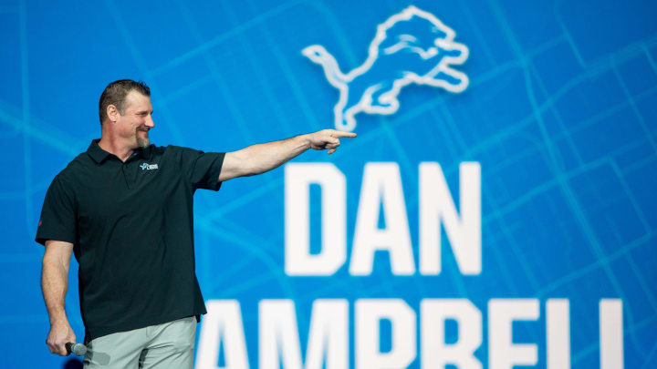 Head Coach Dan Campbell stands on stage during the Detroit Lions' new uniform reveal event inside Ford Field in Detroit on Thursday, April 18, 2024.