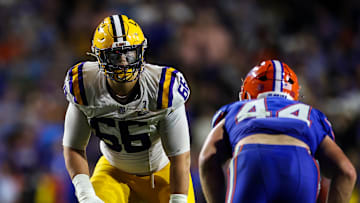 LSU Tigers offensive tackle Will Campbell (L)