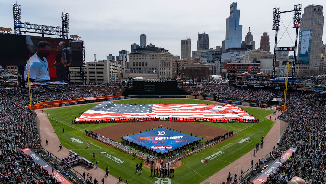 Hundreds of fans stand for the Pledge of Allegiance before the start of the Detroit Tigers’ Opening Day game against the Chicago White Sox at Comerica Park in Detroit on Friday, April 4, 2023.