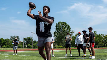 Aidan Chiles, 19, a Michigan State University quarterback, throws a football during a private workout in Detroit on Saturday, June 21, 2025.