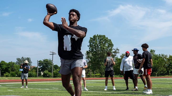 Aidan Chiles, 19, a Michigan State University quarterback, throws a football during a private workout in Detroit on Saturday, June 21, 2025.