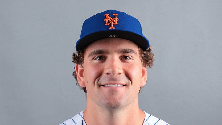 Feb 19, 2026; Port St. Lucie, FL, USA; New York Mets pitcher Ryan Lambert (99) poses for a photo during media day at Clover Park. Mandatory Credit: Sam Navarro-Imagn Images