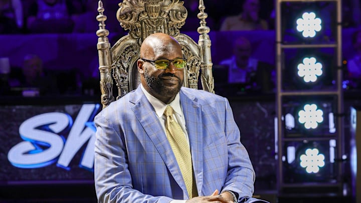 Shaq smiles during a ceremony to retire his #32 jersey at Orlando's Amway Center. Shaq smiles during a ceremony to retire his #32 jersey at Orlando's Amway Center.