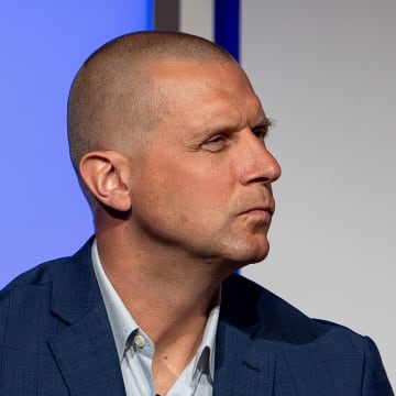 Kentucky head basketball coach Mark Pope listened while Louisville basketball coach Pat Kelsey spoke at the 2024 Leadership Louisville Luncheon at the Kentucky International Convention Center in downtown Louisville on Wednesday, August 28, 2024.