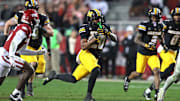 Nov 29, 2025; Fayetteville, Arkansas, USA; Missouri Tigers running back Jamal Roberts (20) rushes during the fourth quarter against the Arkansas Razorbacks at Donald W. Reynolds Razorback Stadium. Missouri won 31-17. Mandatory Credit: Nelson Chenault-Imagn Images