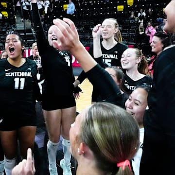 The Ankeny Centennial Jaguars celebrate after defeating Iowa City West Nov. 3, 2025 during the Class 5A Iowa high school state volleyball quarterfinals at Xtream Arena in Coralville, Iowa.