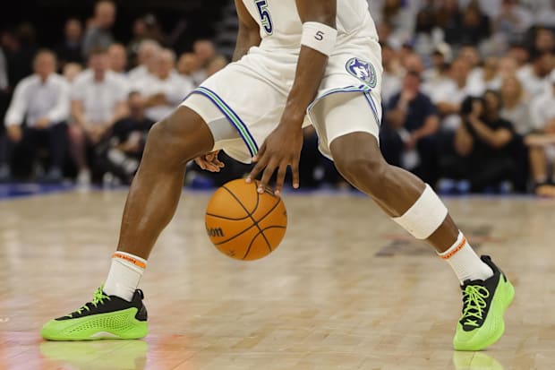 Minnesota Timberwolves guard Anthony Edwards dribbles the basketball.