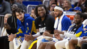 Apr 14, 2024; San Francisco, California, USA; The Golden State Warriors bench watches the closing minutes against the Utah Jazz during the fourth quarter at Chase Center. Mandatory Credit: D. Ross Cameron-USA TODAY Sports