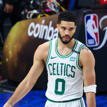 Jun 14, 2024; Dallas, Texas, USA; Boston Celtics forward Jayson Tatum (0) and Boston Celtics guard Jaylen Brown (7) react during the game during game four of the 2024 NBA Finals at American Airlines Center. Mandatory Credit: Kevin Jairaj-USA TODAY Sports