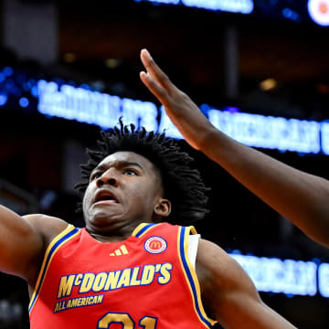 Apr 2, 2024; Houston, TX, USA; McDonald's All American West guard Karter Knox (21) shoots around McDonald's All American East forward Jayden Quaintance (21) during the second half at Toyota Center. Mandatory Credit: Maria Lysaker-USA TODAY Sports