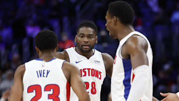Mar 7, 2024; Detroit, Michigan, USA;  Detroit Pistons guard Jaden Ivey (23) center Isaiah Stewart (28) and center Jalen Duren (0) celebrates in the second half against the Brooklyn Nets at Little Caesars Arena. Mandatory Credit: Rick Osentoski-Imagn Images