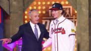 MLB Commissioner Rob Manfred takes a photo with Cam Caminiti after he is drafted by the Atlanta Braves