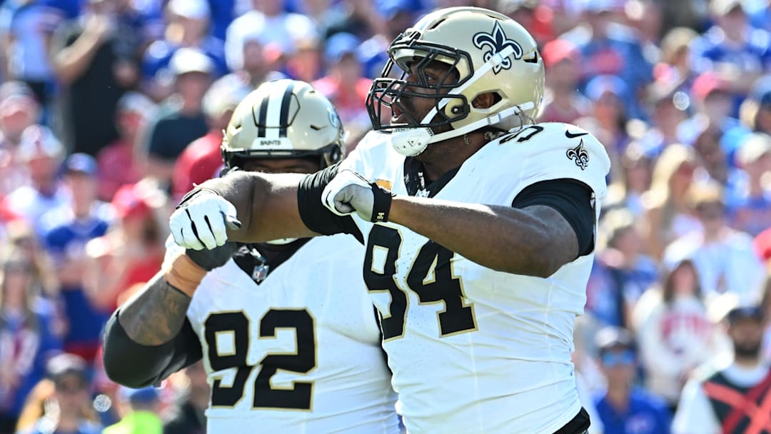 Sep 28, 2025; Orchard Park, New York, USA; New Orleans Saints defensive end Cameron Jordan (94) reacts after sacking Buffalo Bills quarterback Josh Allen (17) during the second quarter at Highmark Stadium.