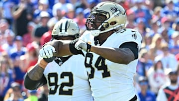 Sep 28, 2025; Orchard Park, New York, USA; New Orleans Saints defensive end Cameron Jordan (94) reacts after sacking Buffalo Bills quarterback Josh Allen (17) during the second quarter at Highmark Stadium.
