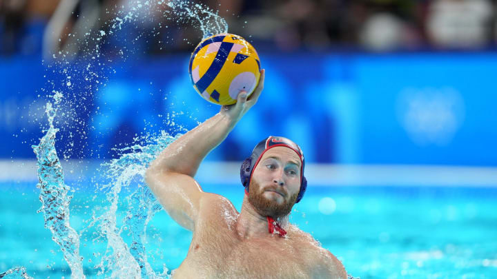 Aug 5, 2024; Nanterre, France; United States driver Marko Vavic (3) scores a goal against Croatia in a men's water polo group stage match during the Paris 2024 Olympic Summer Games at Paris La Defense Arena.