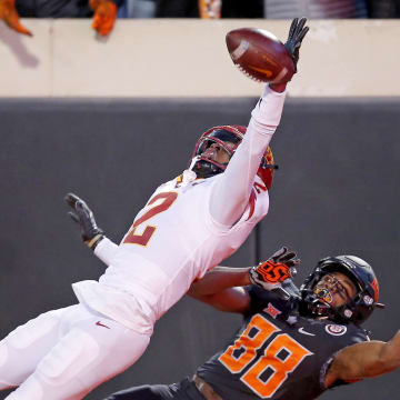 Nov 12, 2022; Stillwater, Oklahoma, USA;  Iowa State Cyclones defensive back T.J. Tampa (2) deflects a pass intended for Oklahoma State Cowboys wide receiver Langston Anderson (88) in the fourth quarter at Boone Pickens Stadium. OSU won 20-14. Mandatory Credit: Sarah Phipps-USA TODAY Sports