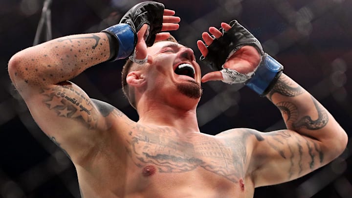 Nov 11, 2023; New York, NY, USA; Tom Aspinall (blue gloves) reacts to beating Sergei Pavlovich (red gloves) during UFC 295 at Madison Square Garden. Mandatory Credit: Wendell Cruz-Imagn Images Nov 11, 2023; New York, NY, USA; Tom Aspinall (blue gloves) reacts to beating Sergei Pavlovich (red gloves) during UFC 295 at Madison Square Garden. Mandatory Credit: Wendell Cruz-Imagn Images