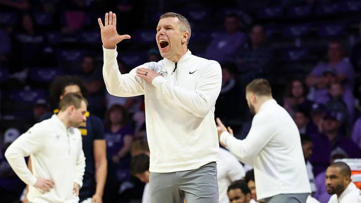 Mar 3, 2026; Manhattan, Kansas, USA; West Virginia Mountaineers head coach Ross Hodge yells at his team during the first half against the Kansas State Wildcats at Bramlage Coliseum. Mandatory Credit: Scott Sewell-Imagn Images