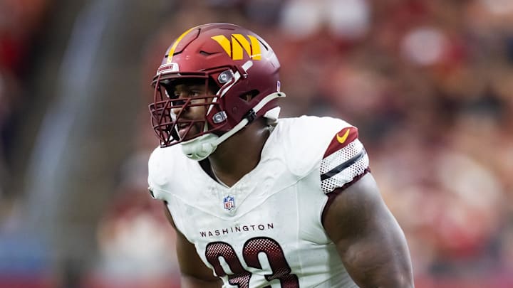 Washington Commanders defensive tackle Jonathan Allen gets ready for a play.
