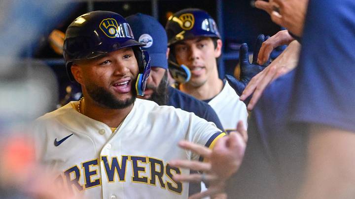 Jun 4, 2026; Milwaukee, Wisconsin, USA;  Milwaukee Brewers left fielder Jackson Chourio (11) celebrates in the dugout after hitting a two run home run in the fifth inning against the San Francisco Giants at American Family Field. Mandatory Credit: Benny Sieu-Imagn Images