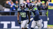 Nov 24, 2024; Seattle, Washington, USA; Seattle Seahawks linebacker Tyrice Knight (48) celebrates after sacking Arizona Cardinals quarterback Kyler Murray (1) (not pictured) during the first half at Lumen Field. Mandatory Credit: Steven Bisig-Imagn Images