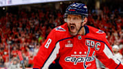 Ovechkin celebrates scoring a goal against the Chicago Blackhawks, a game during which he tied Gretzky's all-time goals record.