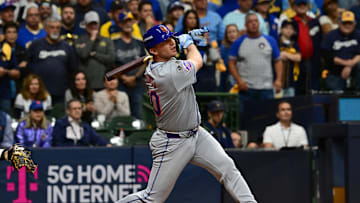 Oct 3, 2024; Milwaukee, Wisconsin, USA; New York Mets first baseman Pete Alonso (20) hits a three run home run against the Milwaukee Brewers in the ninth inning during game three of the Wildcard round for the 2024 MLB Playoffs at American Family Field. Mandatory Credit: Benny Sieu-Imagn Images
