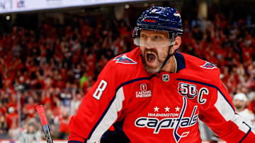 Ovechkin celebrates scoring a goal against the Chicago Blackhawks, a game during which he tied Gretzky's all-time goals record.