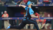 Jul 16, 2024; Arlington, Texas, USA; National League pitcher Tanner Scott of the Miami Marlins (66) pitches in the eighth inning during the 2024 MLB All-Star game at Globe Life Field. Mandatory Credit: Kevin Jairaj-USA TODAY Sports