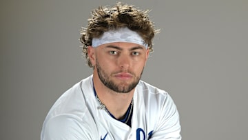 Feb 19, 2025; Surprise, AZ, USA; Kansas City Royals catcher Carter Jensen (74) poses for a photo during media day. Mandatory Credit: Jayne Kamin-Oncea-Imagn Images  