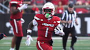 Louisville’s Isaac Brown runs the ball against Virginia at L&N Stadium Saturday